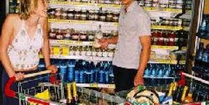 couple meets in food store