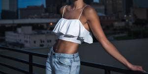 a woman in a crop top