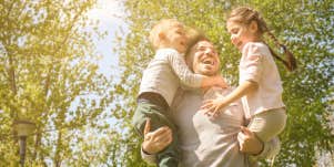 Dad playing with kids