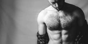 man with exposed hairy chest