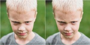 mirrored image of angry-looking child