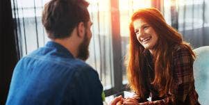 man and woman talking