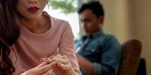 woman looking at ring