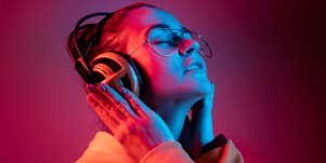 woman listening to headphones