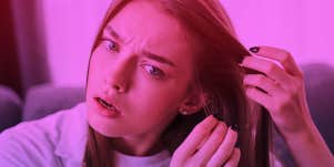 woman touching hair