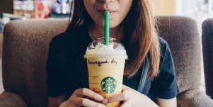 woman drinking starbucks coffee