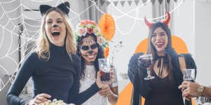 Women in Halloween costumes at a party