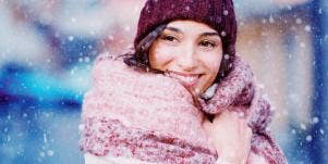 happy woman in the snow