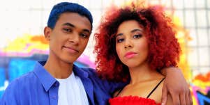 young couple posing at carnival
