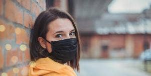 woman wearing mask outside