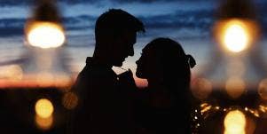 silhouette of couple at night