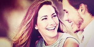 couple smiling looking at each other