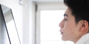 man looking in the mirror