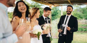 Wedding guests laughing