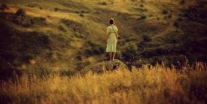 girl standing on the plains