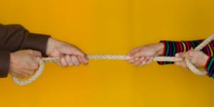 tug of war giving and taking