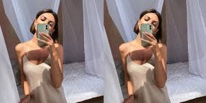 woman taking a mirror selfie