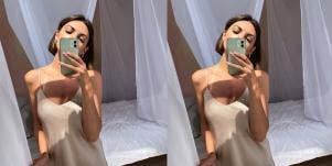 woman taking a mirror selfie
