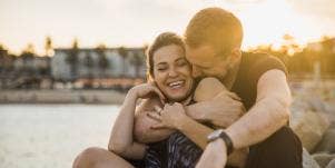 couple embracing in sunset