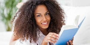 happy woman reading book