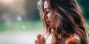 spiritual woman with hands together