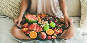 woman with fruit platter