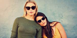 Blond and Brunette women friends 