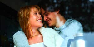 couple cuddling and laughing