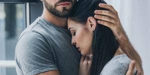 man comforting women