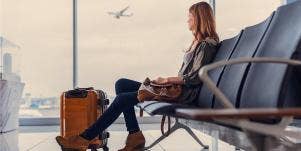 woman sitting at airport
