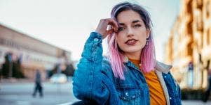 woman with pink hair posing