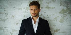 man in suit looking at camera