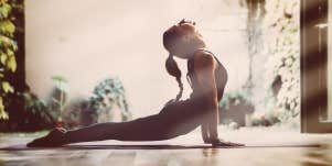 woman doing yoga stretch