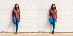 mirrored image of woman leaning against brick wall