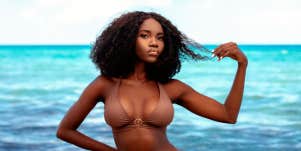 confident woman in bikini at beach