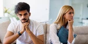 couple arguing on couch