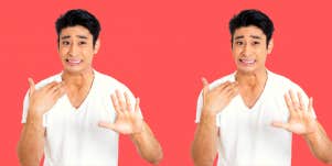 man signaling for you to stop talking before you say something you'll regret