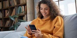 woman playing on her smartphone