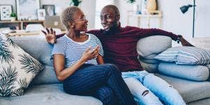 couple on couch at home talking