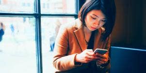 woman networking on her phone