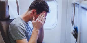 anxious man on plane