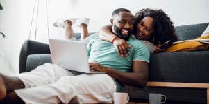man and woman cuddling