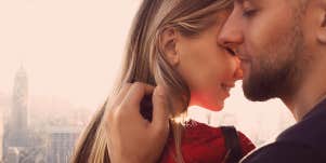 guy kissing girlfriend