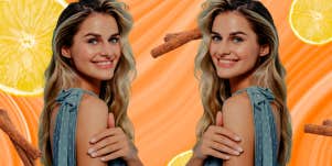 woman smiling with lemons and cinnamon