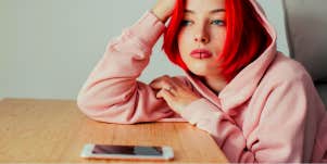 sad girl trying not to text her ex