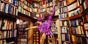 woman surrounded by books