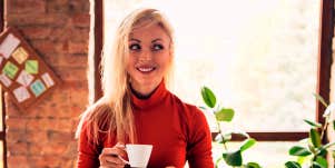 woman calmly smiling with tea