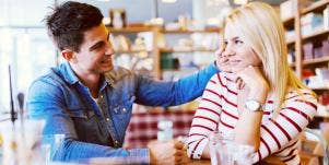 smiling man and woman flirting