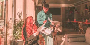 man and woman speaking 