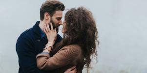 man and woman embracing